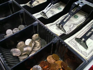 New Jersey small business owner overwhelmed by manual tasks at a desk